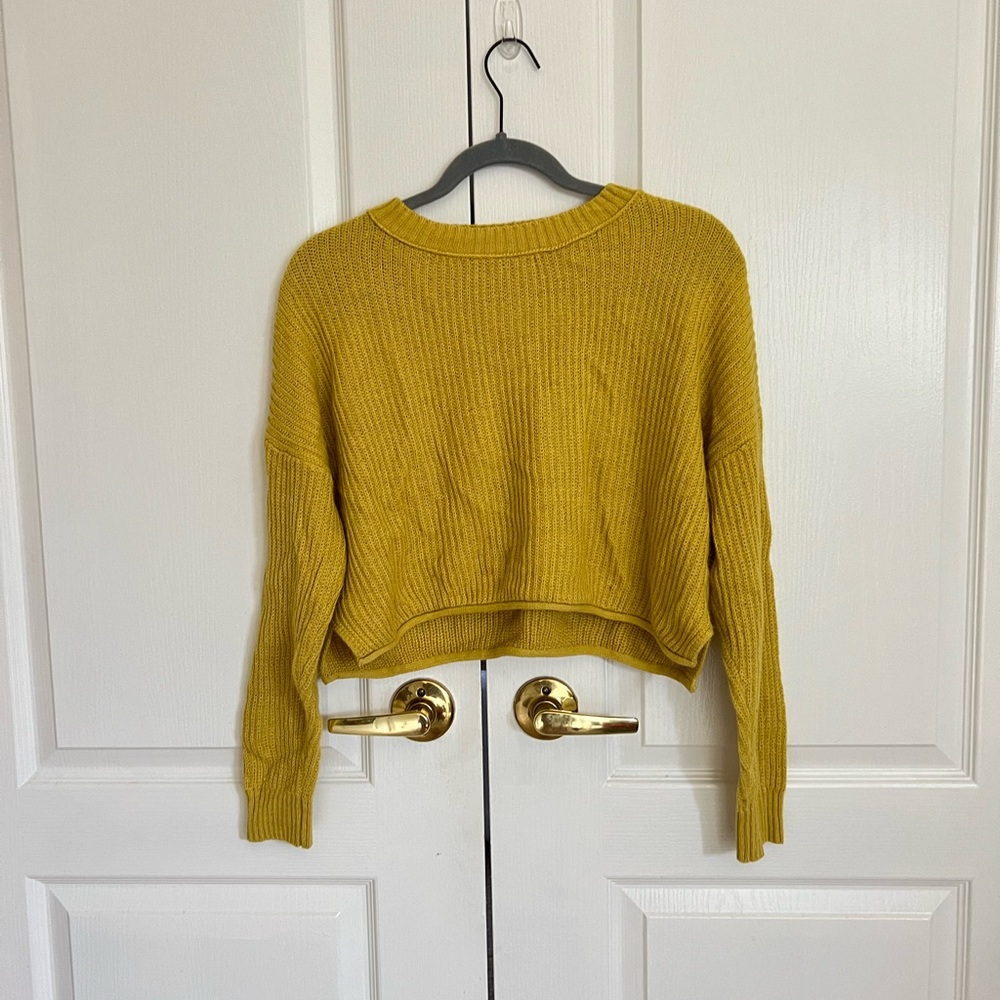 Mustard yellow sweater. Never worn